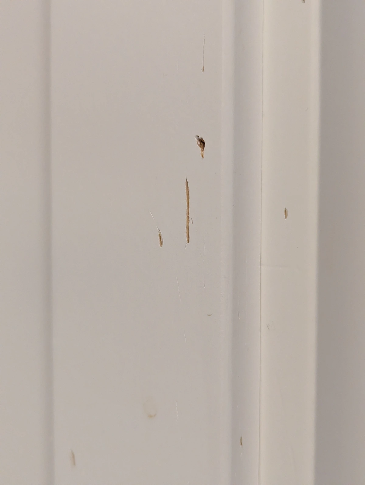 Looking for a good way to fix scratches in a wooden door frame