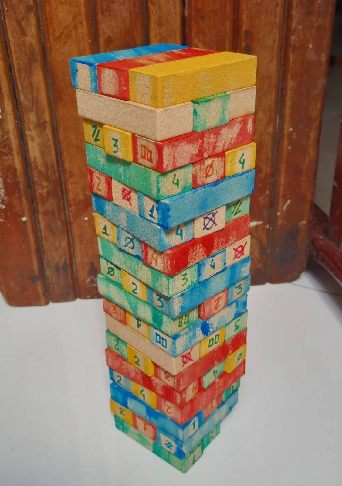I've colored jenga pieces to play uno stacko. House rules for extra blocks?