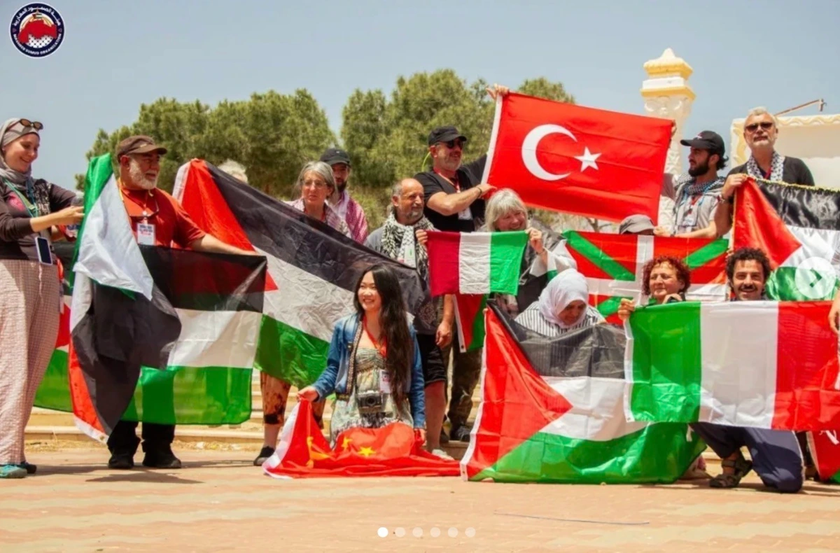 No. 1 of 6 photos. 10 + people with flags of Palestine, Turkey, Italy & more. 