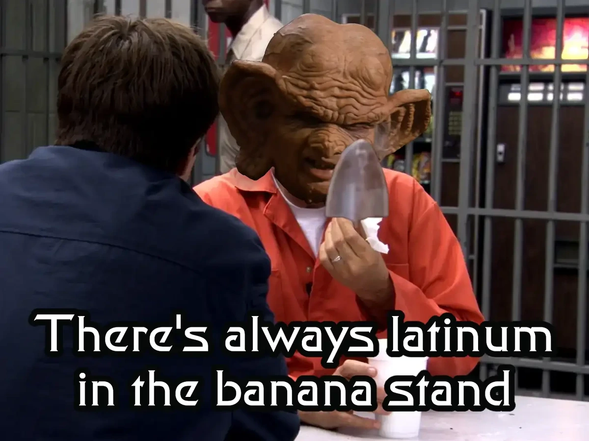 Head of Grand Nagus Zek on George Sr., eating jumja stick, saying "There's always latinum in the banana stand"